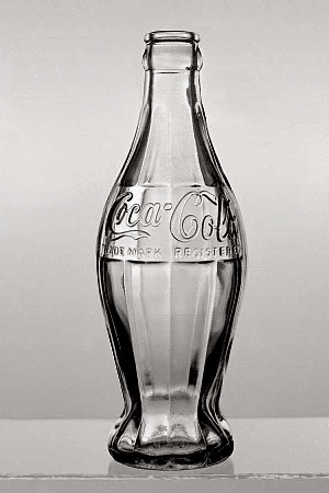 Image of Coke's first contoured bottle in 1915